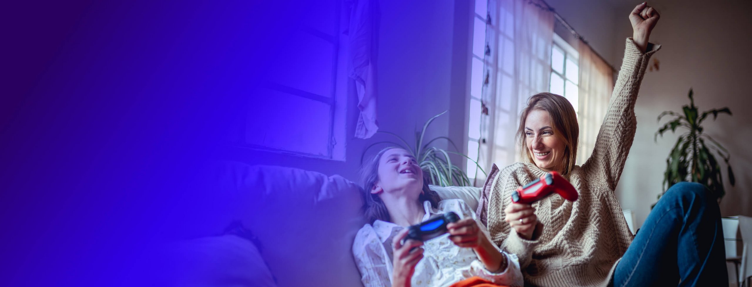 a mother and child playing video games together