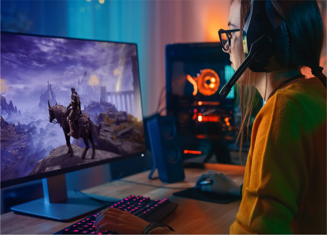 gamer playing Elden Ring on a computer